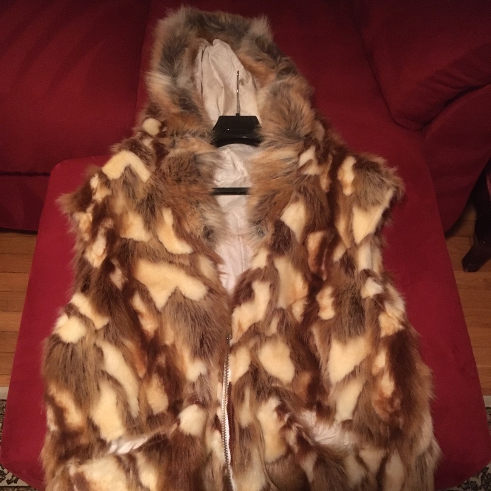 Handmade faux fur vest with hood. Zip front. Pocketed. Size 2XL. Worn about 10x.